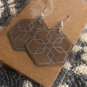 Homemade wooden earrings.  Snowflake silver